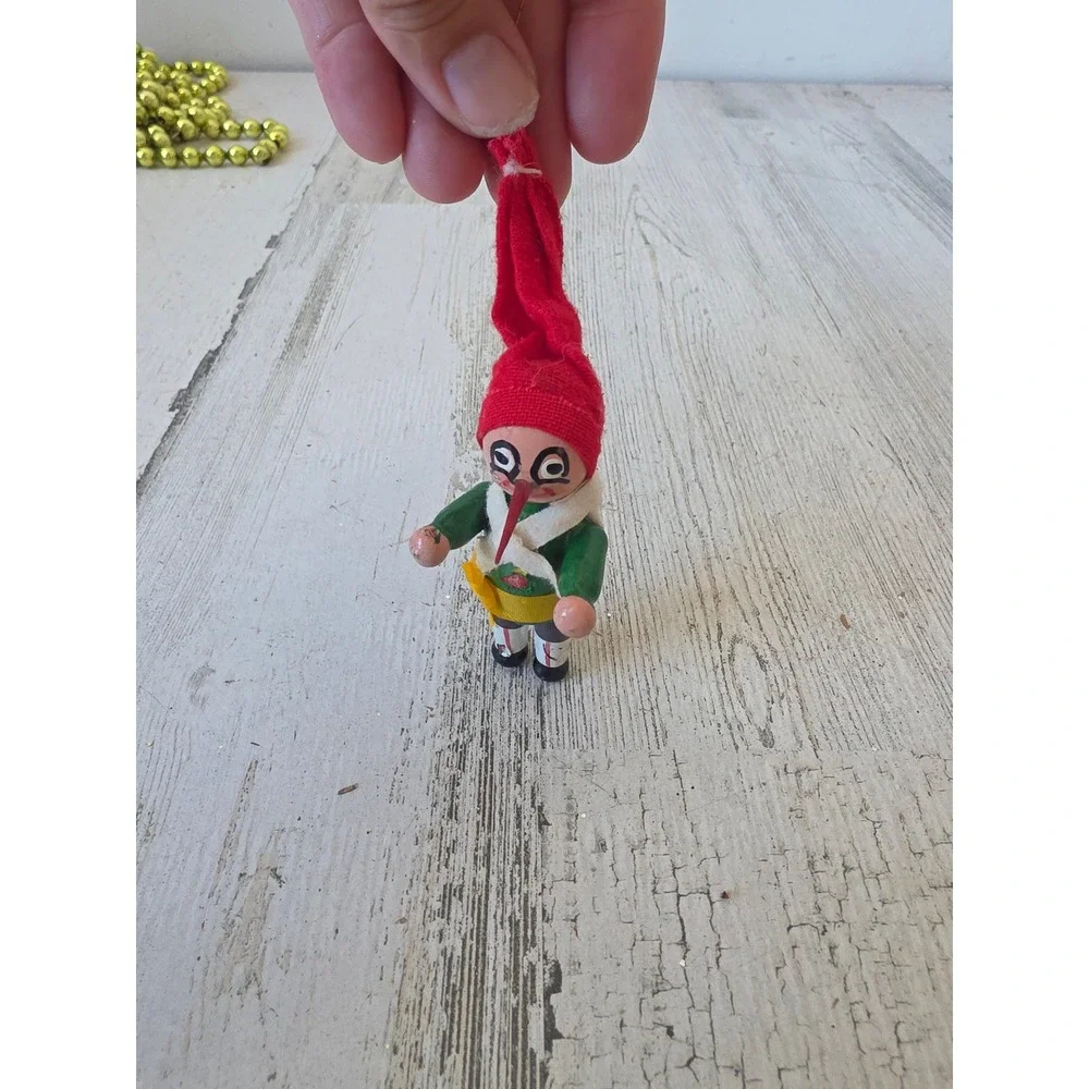 Vintage wooden Pinocchio ornament Xmas tree green red